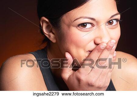 Stock Photo - Woman giggling . Fotosearch