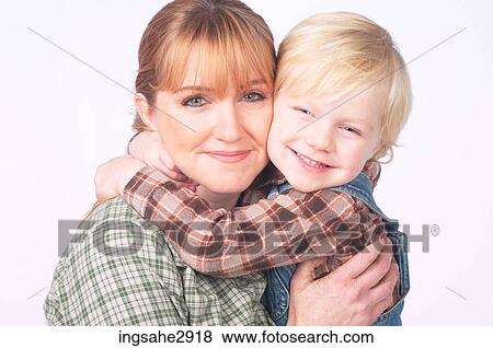 Stock Photo - Woman holding little boy . Fotosearch
