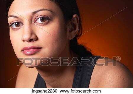 Woman in black sleeveless shirt View Large Photo Image Stock Image - Woman in black sleeveless shirt . Fotosearch
