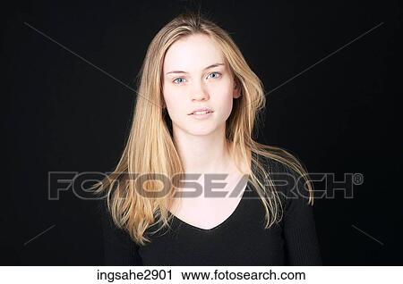 Woman in front of black background View Large Photo Image Stock Image - Woman in front of black background . Fotosearch