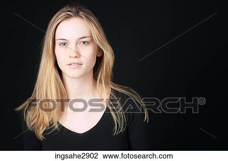 Woman in front of black background View Large Photo Image Stock Image - Woman in front of black background . Fotosearch