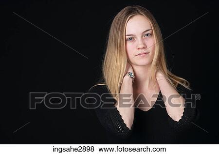 Woman in front of black background View Large Photo Image Stock Photo - Woman in front of black background . Fotosearch
