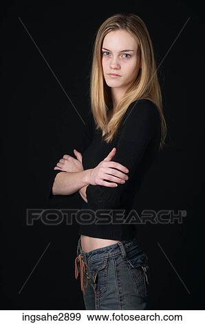 Woman in front of black background View Large Photo Image Stock Photo - Woman in front of black background . Fotosearch