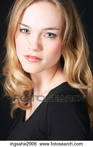 Woman in front of black background View Large Photo Image Stock Photograph - Woman in front of black background . Fotosearch