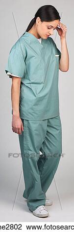 Stock Image - woman in hospital scrubs . Fotosearch
