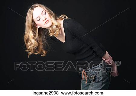 Woman in jeans View Large Photo Image Stock Photo - Woman in jeans . Fotosearch