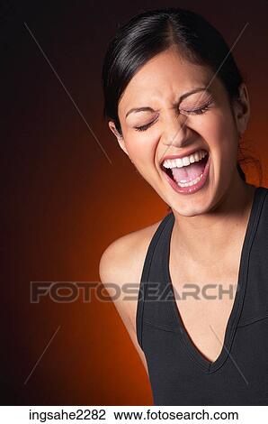 Stock Image - Woman laughing . Fotosearch