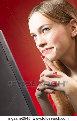 Stock Photography - Woman using computer . Fotosearch