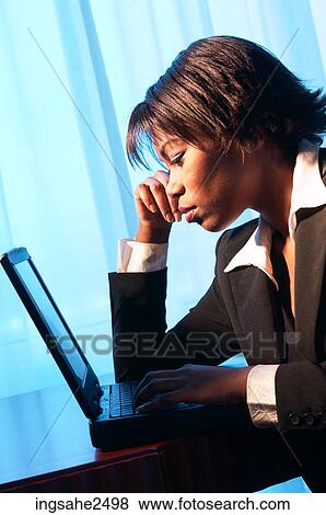 Woman using laptop an 1 View Large Photo Image Stock Photo - Woman using laptop an 1. Fotosearch