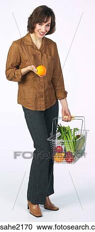 Woman with basket View Large Photo Image Stock Image - Woman with basket . Fotosearch