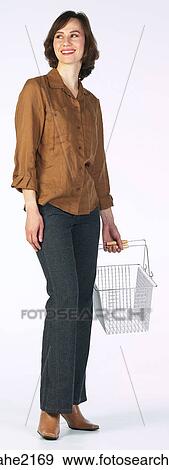 Woman with basket View Large Photo Image Stock Photo - Woman with basket . Fotosearch