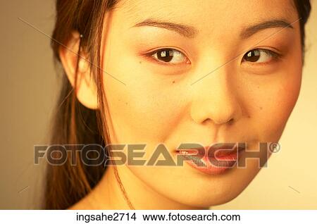 Picture - Woman's face . Fotosearch