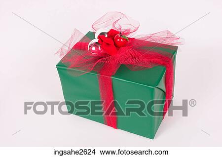 Wrapped Christmas present View Large Photo Image Picture - Wrapped Christmas present . Fotosearch