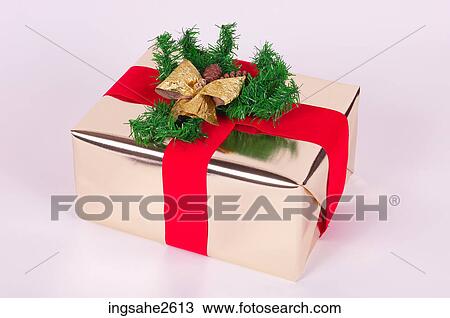 Stock Image - Wrapped Christmas present . Fotosearch