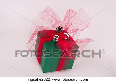 Stock Image - Wrapped Christmas present . Fotosearch