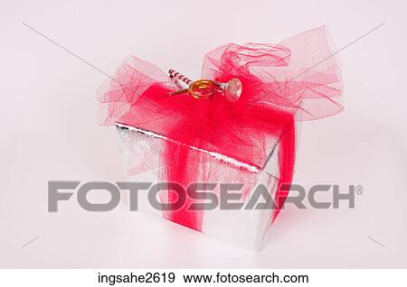 Stock Photo - Wrapped Christmas present . Fotosearch