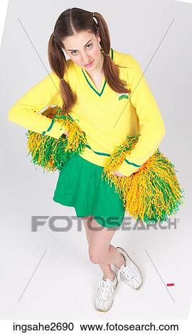 Stock Image - Young female cheerleader . Fotosearch
