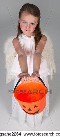 Young girl dressed as angel View Large Photo Image Picture - Young girl dressed as angel . Fotosearch