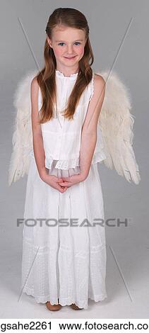 Young girl dressed as angel View Large Photo Image Stock Image - Young girl dressed as angel . Fotosearch