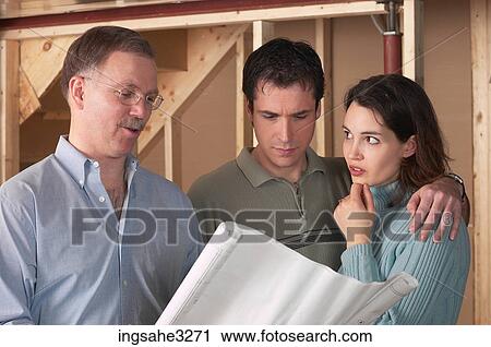 Adult couple looking at blue prints View Large Photo Image Stock Image - Adult couple looking at blue prints . Fotosearch