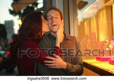 Adult couple window shopping for jewelry View Large Photo Image Stock Photograph - Adult couple window shopping for jewelry . Fotosearch