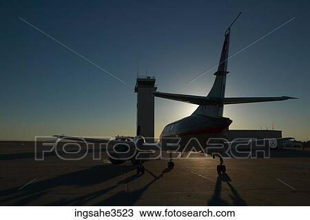 Airplane being pushed by vehicle View Large Photo Image Stock Image - Airplane being pushed by vehicle . Fotosearch