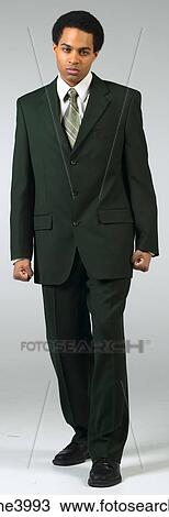 Stock Image - Angry businessman in black suit. Fotosearch