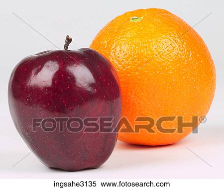 Stock Photography - Apple and orange . Fotosearch