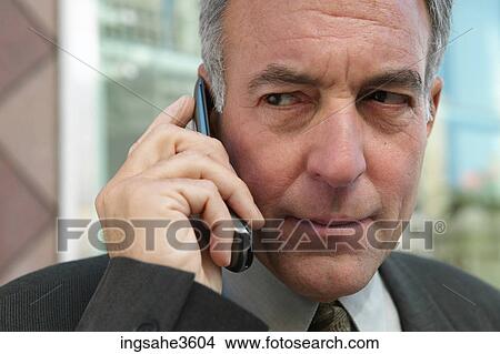 Business man on cellphone View Large Photo Image Picture - Business man on cellphone . Fotosearch
