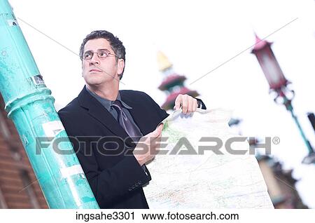 Business man on city street View Large Photo Image Stock Image - Business man on city street . Fotosearch