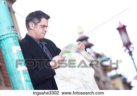 Business man on city street View Large Photo Image Stock Image - Business man on city street . Fotosearch