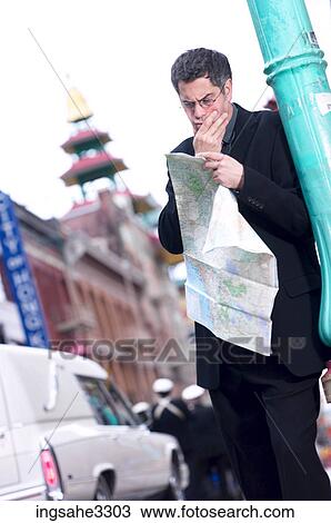 Business man on city street View Large Photo Image Stock Image - Business man on city street . Fotosearch