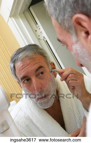Stock Photo - Business man shaving . Fotosearch