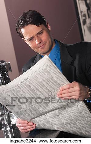Businessman reading View Large Photo Image Picture - Businessman reading . Fotosearch