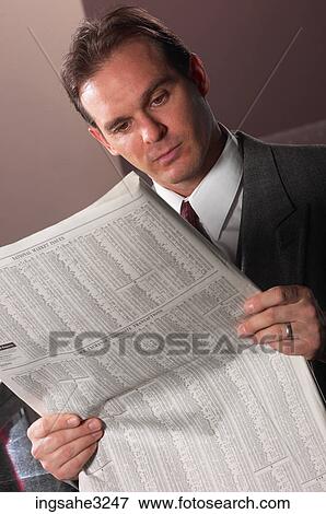 Businessman reading View Large Photo Image Stock Photo - Businessman reading . Fotosearch
