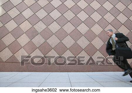 Businessman running View Large Photo Image Stock Image - Businessman running . Fotosearch