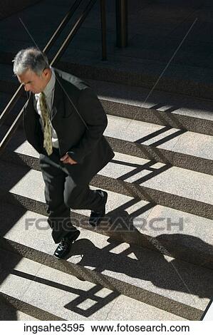 businessman walking down stairs View Large Photo Image Stock Photography - businessman walking down stairs . Fotosearch