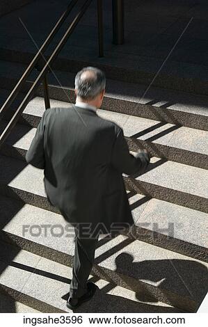 businessman walking up stairs View Large Photo Image Stock Photograph - businessman walking up stairs . Fotosearch