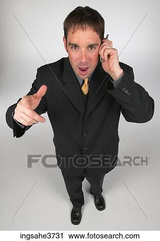 Businessman with cell phone View Large Photo Image Stock Image - Businessman with cell phone . Fotosearch