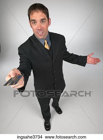 Businessman with credit card View Large Photo Image Picture - Businessman with credit card . Fotosearch