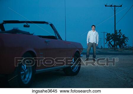 Car driving on dirt road at night View Large Photo Image Stock Photography - Car driving on dirt road at night . Fotosearch