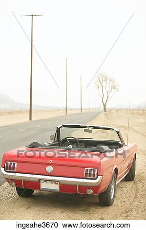 Stock Image - Car on side of road . Fotosearch