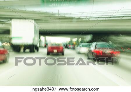Cars and trucks on highway View Large Photo Image Stock Photo - Cars and trucks on highway . Fotosearch