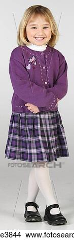 Caucasian blonde female child standing and smiling View Large Photo Image Picture - Caucasian blonde female child standing and smiling . Fotosearch
