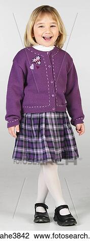 Caucasian blonde female child standing and smiling View Large Photo Image Stock Image - Caucasian blonde female child standing and smiling . Fotosearch