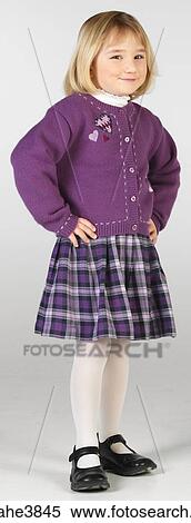 Caucasian blonde female child standing and smiling View Large Photo Image Stock Photography - Caucasian blonde female child standing and smiling . Fotosearch
