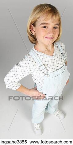 Caucasian female child standing and smiling View Large Photo Image Stock Photography - Caucasian female child standing and smiling. Fotosearch