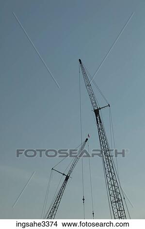 Construction cranes View Large Photo Image Picture - Construction cranes . Fotosearch