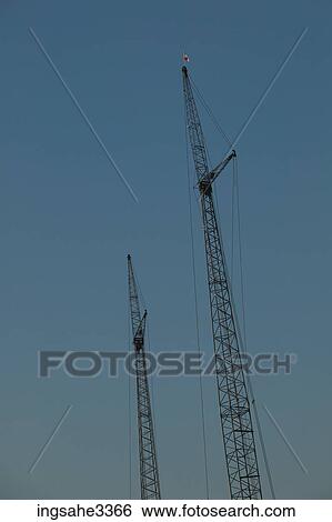 Stock Photograph - Construction cranes . Fotosearch