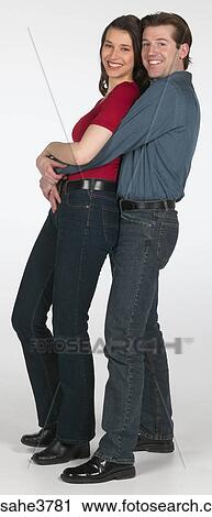 Stock Image - Couple holding each other . Fotosearch